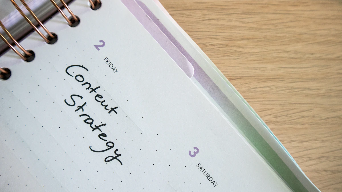 Un carnet à spirale et un stylo posés sur un bureau